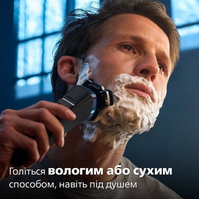 Бритва електр. Philips роторна Series 7000, 9Вт, бритв.головок-3, Li-Ion, сух.+волог., тример, чохол, Bt., сіро-синій (S7882/55) Бритва електр. Philips роторна Series 7000, 9Вт, бритв.головок-3, Li-Ion, сух.+волог., тример, чохол, Bt., сіро-синій (S7882/55)