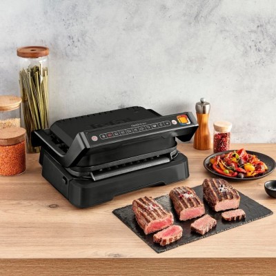 Гриль Tefal прижимний OptiGrill 2100Вт, темп. режимів-4, з`ємні пластини, метал, чорний (GC772830) Гриль Tefal прижимний OptiGrill 2100Вт, темп. режимів-4, з`ємні пластини, метал, чорний (GC772830)