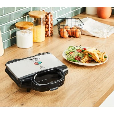 Сендвічмейкер Tefal Ultracompact 700Вт, 1 пластина-сендвіч, корпус-нержав.сталь/пластик, чорний (SM155212) Сендвічмейкер Tefal Ultracompact 700Вт, 1 пластина-сендвіч, корпус-нержав.сталь/пластик, чорний (SM155212)