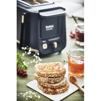 Тостер Tefal Includeo 850Вт, розморожування, щипці, термопластик, чорний (TT533811) Тостер Tefal Includeo 850Вт, розморожування, щипці, термопластик, чорний (TT533811)