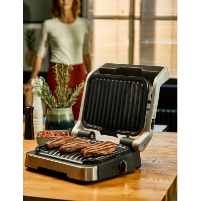 Гриль Tefal прижимний OptiGrll 2100Вт, темп. режимів-4, з`ємні пластини, метал (GC772D30) Гриль Tefal прижимний OptiGrll 2100Вт, темп. режимів-4, з`ємні пластини, метал (GC772D30)